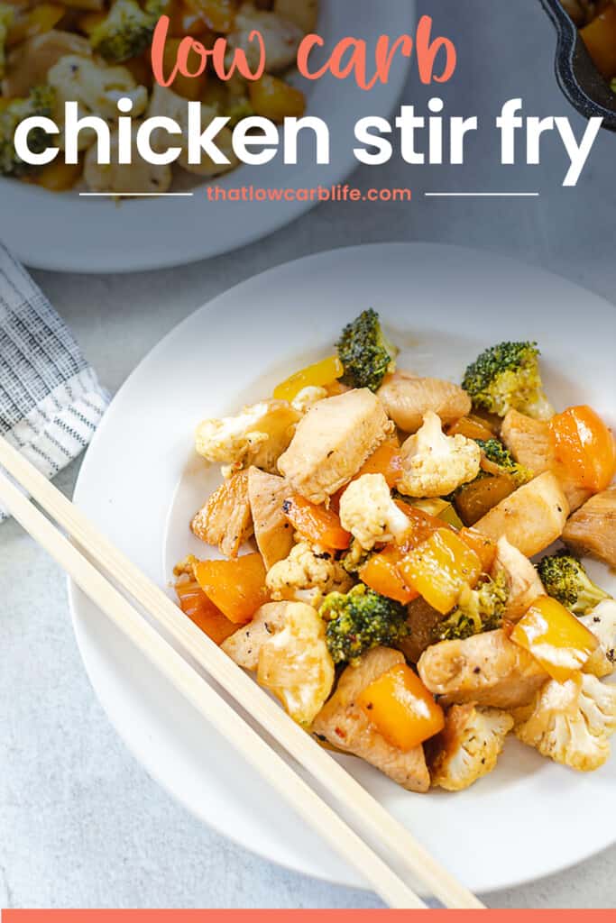 chicken stir fry on plate with chopsticks.