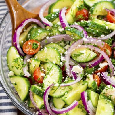 Bowl of cucumber tomato feta salad.