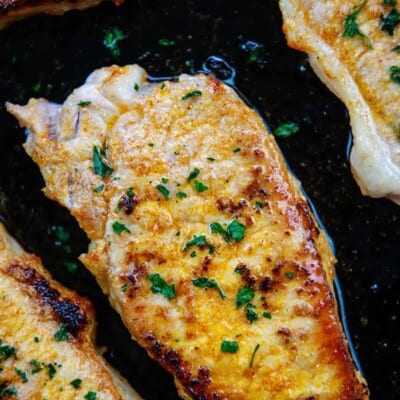 pork chops in cast iron skillet.
